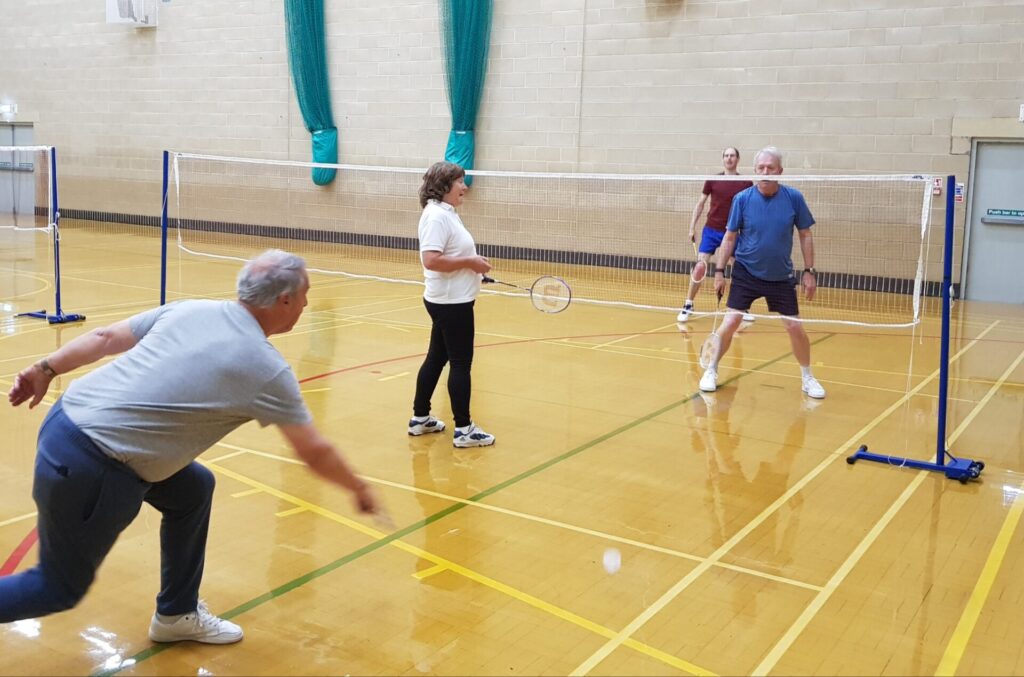 An image of the group playing badminton