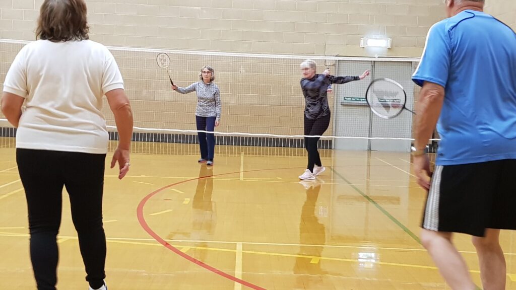 An image of the group playing badminton