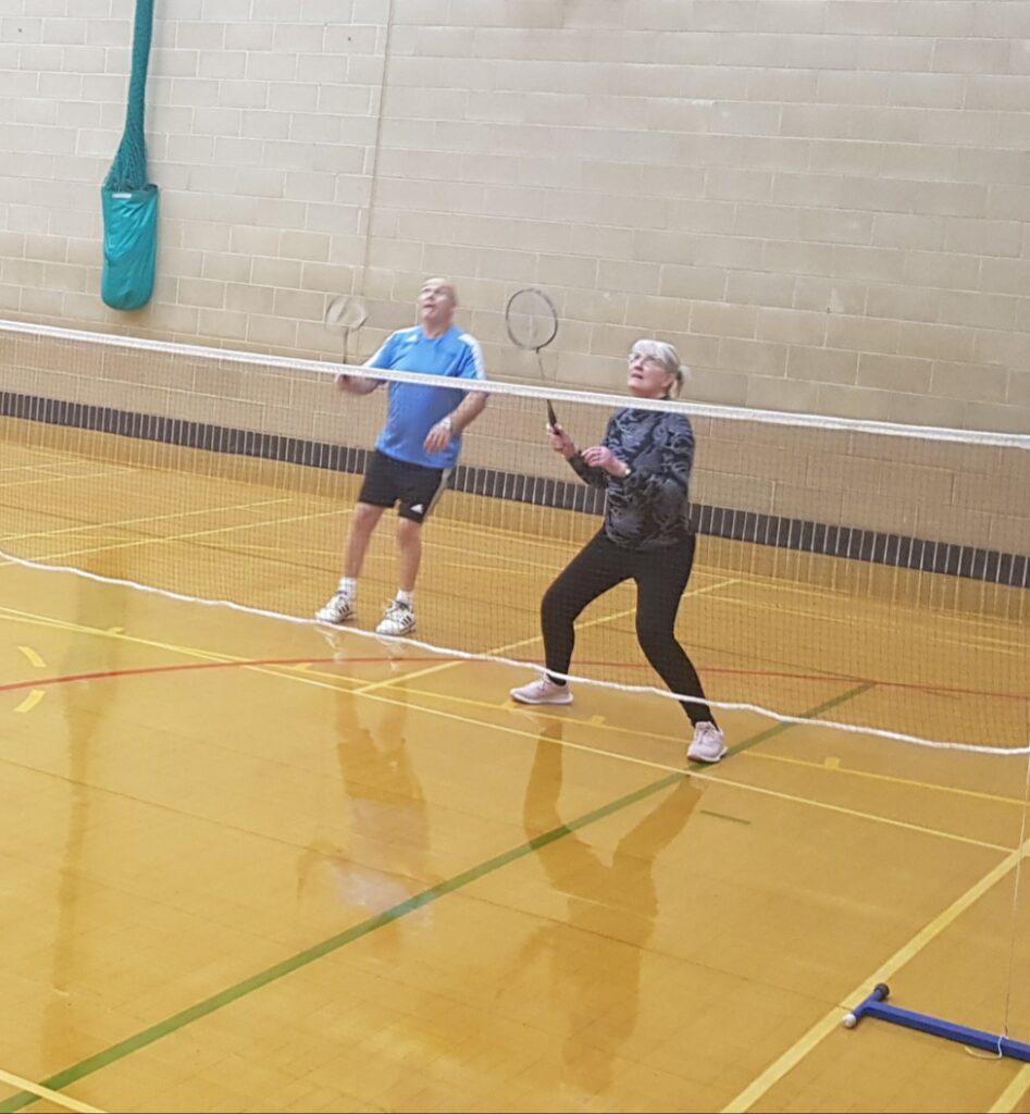 An image of the group playing badminton