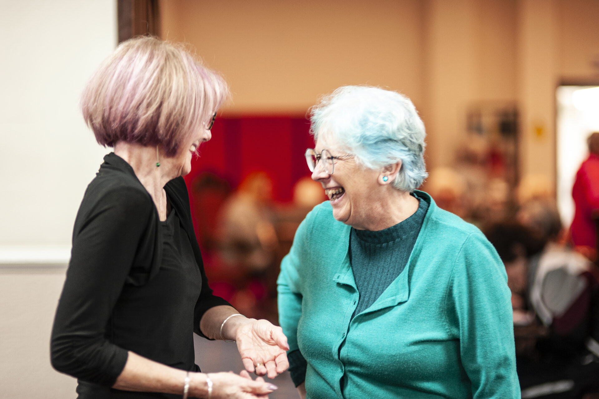 An image of two women laughing