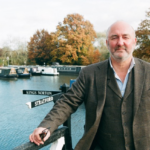 An image of the author Andy Griffee standing by the canal