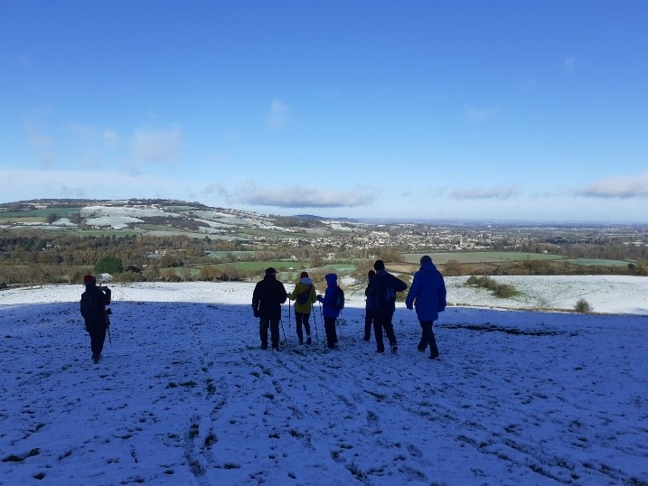 Walkers in the snow on a cold but sunny morning.